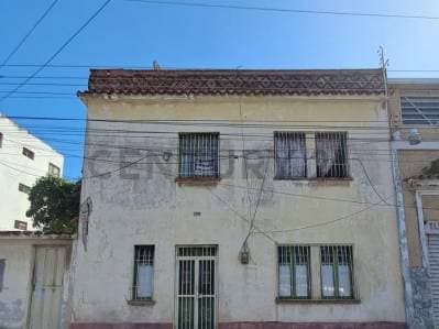 Terreno con Bienhechuría, C. Zamora Porlamar. media cuadra antes boulevard Gómez